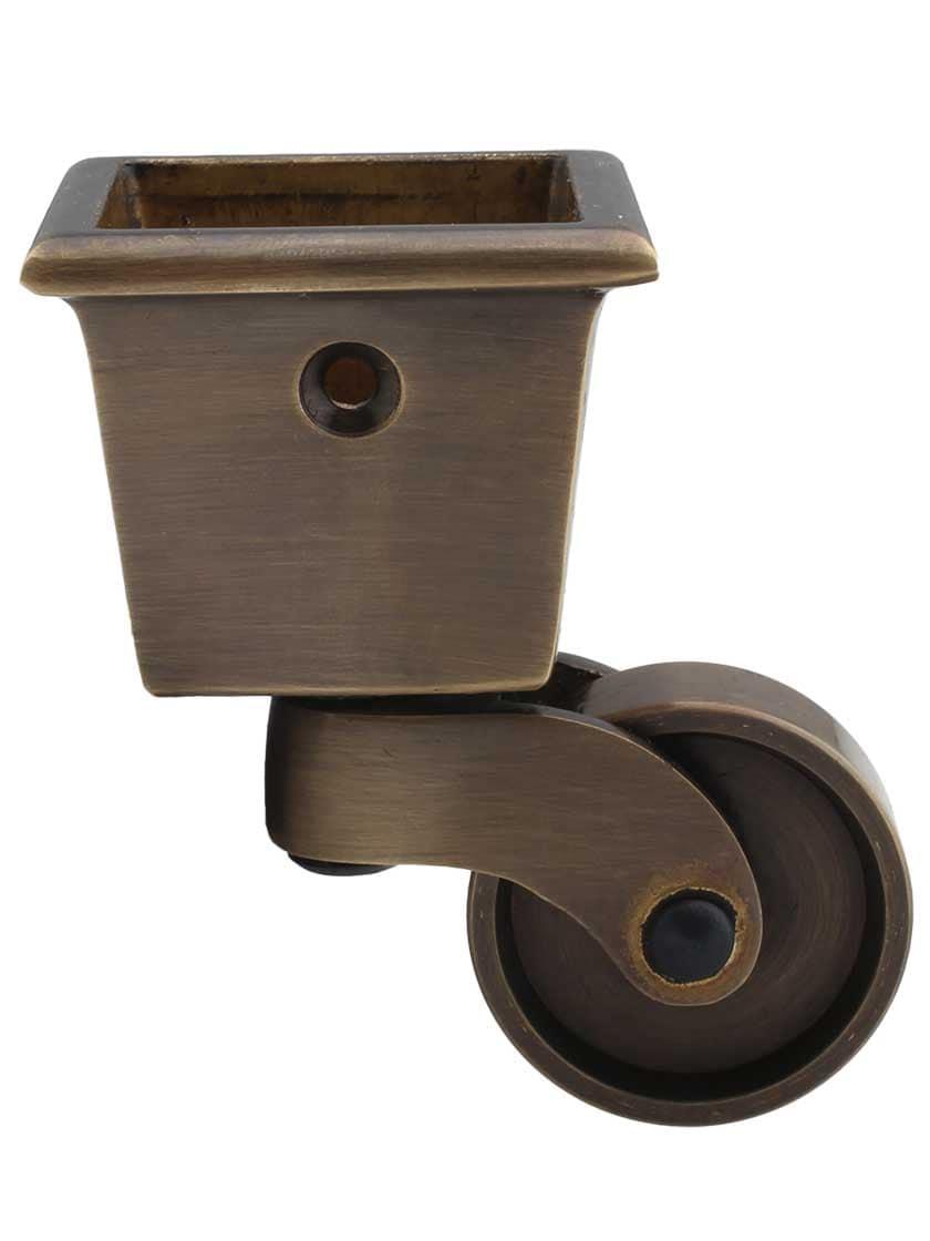 Casters |   Large Square-Cup Caster with 1 1/4″ Brass Wheel in Antique-By-Hand Casters Casters